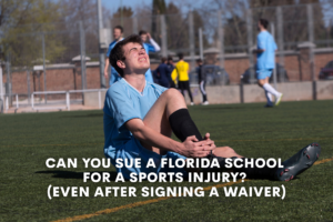 high-school aged soccer player on ground with ankle injury writhing in pain on school soccer field